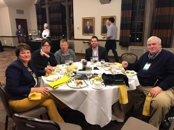 Membership Meeting Andrea Coron Table 600x450